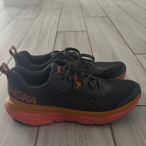 Hoka Black and Orange Running Shoes